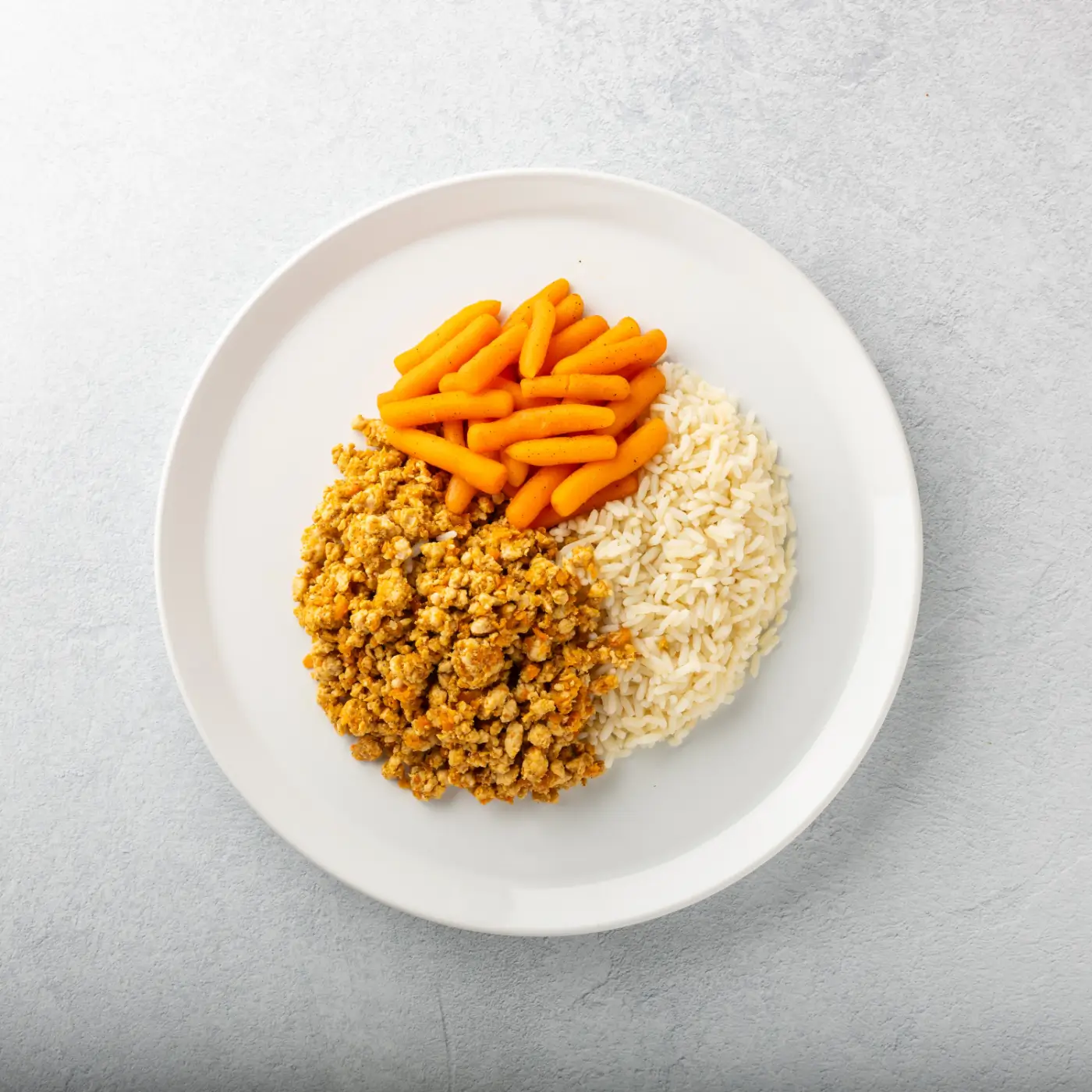 Mljevena puretina s rižom i baby mrkvom